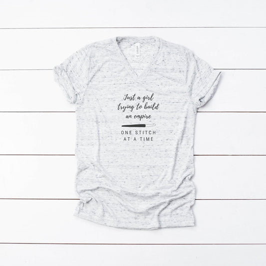 A girl buidling an empire one stitch at a time Vneck T shirt